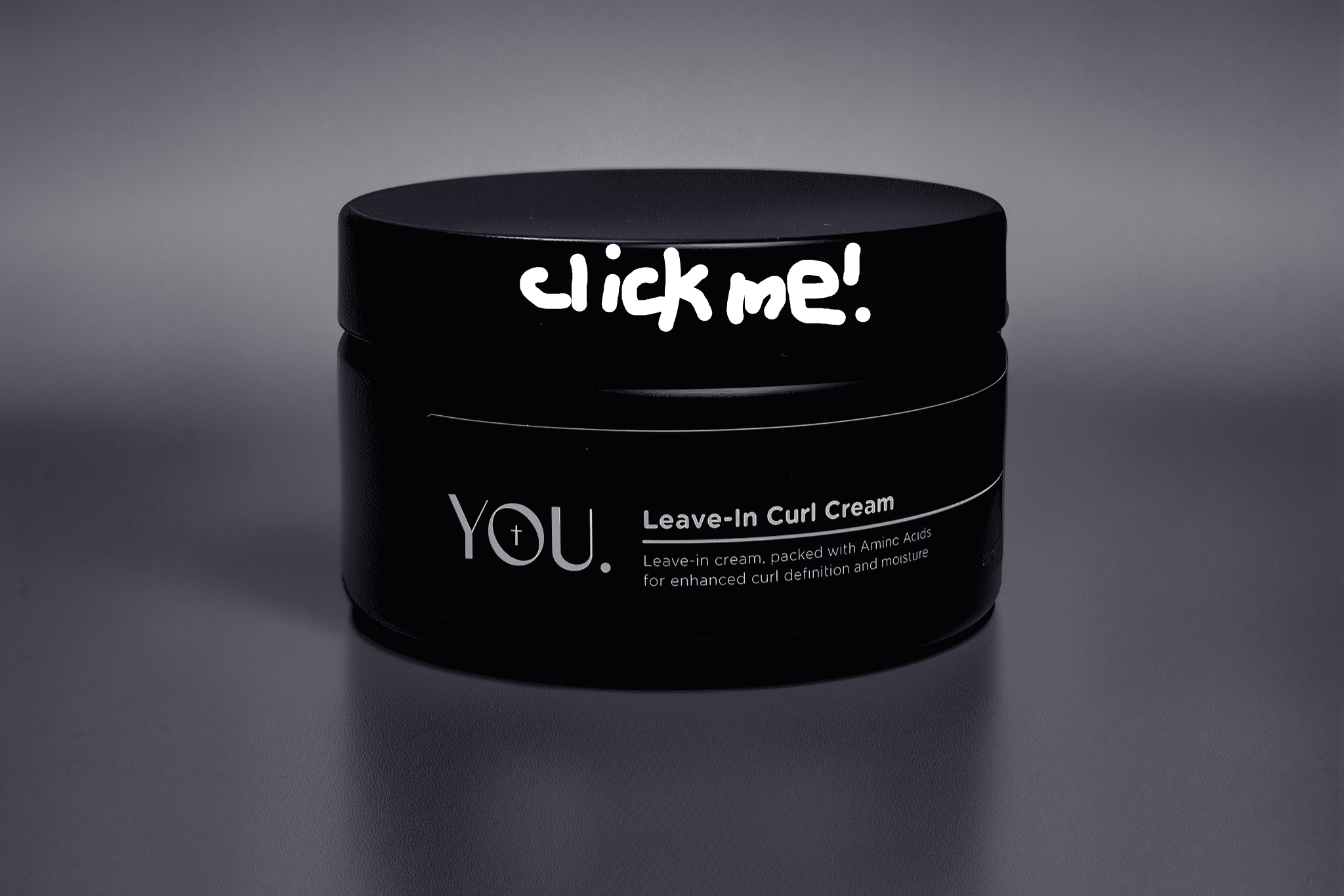 Black jar of 'YOU' Leave-In Curl Cream on a gray background